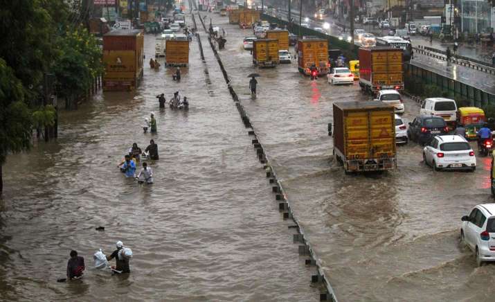 Delhi rains LIVE: Heavy downpour causes traffic snarls in city, IMD issues orange alert