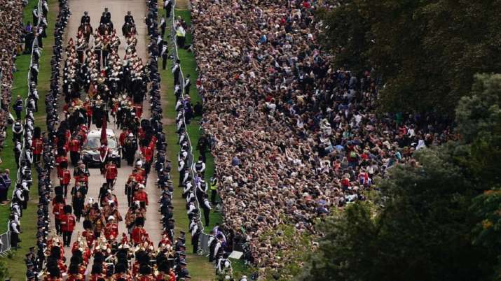India Tv - The Ceremonial Procession of the coffin of Queen Elizabeth II travels down the Long Walk as it arrives at Windsor Castle for the Committal Service at St George's Chapel, in Windsor, England, Monday, Sept. 19, 2022