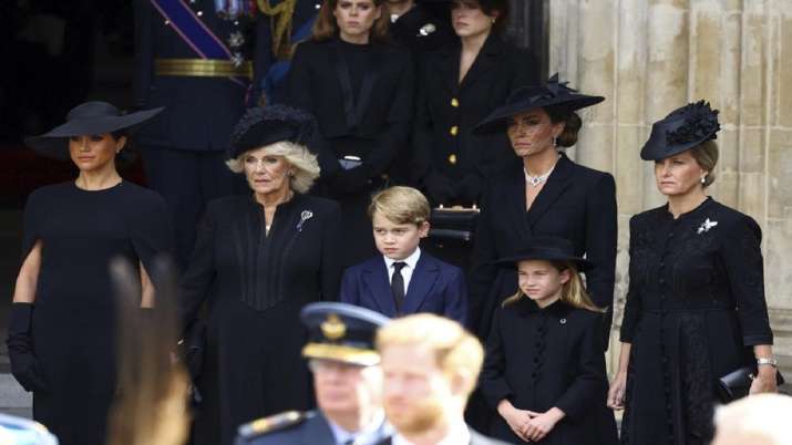 India Tv - Camilla, the Queen Consort, Prince George, Princess Charlotte, Kate, Princess of Wales, Meghan, Duchess of Sussex and Sophie, Countess of Wessex stand after a service at Westminster Abbey on the day of the state funeral and burial of Britain's Queen Elizabeth in London