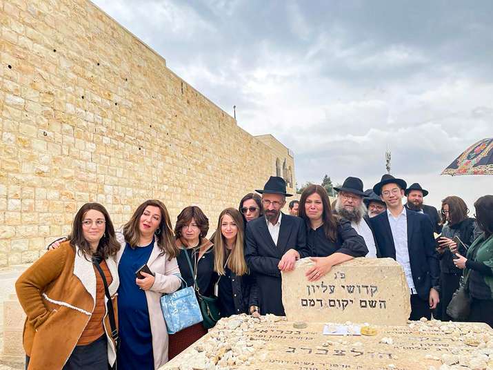 India Tv - Moshe Holtzberg, one of the survivors of the 26/11 Mumbai terror attacks, at his father’s grave by Mount Olives in Jerusalem on November 25, 2022.