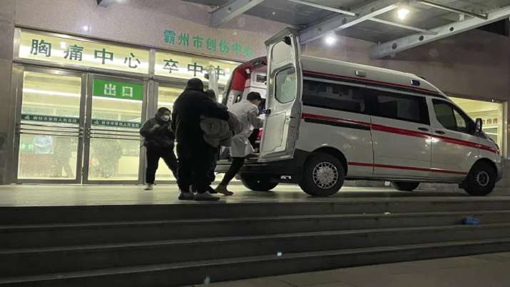 India Tv - An ambulance prepares to transfer a patient in critical care to other hospitals due to overcapacity at the emergency department of the Langfang No. 4 People's Hospital in Bazhou city in northern China's Hebei province.