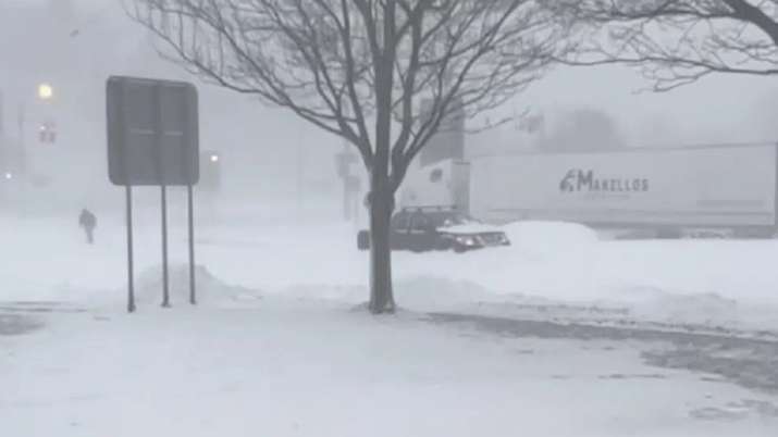 India Tv - High winds and snow covers the streets and vehicles in Buffalo, New York.