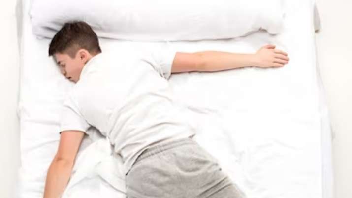 India Tv - Avoid stomach sleeping position to avoid back injury