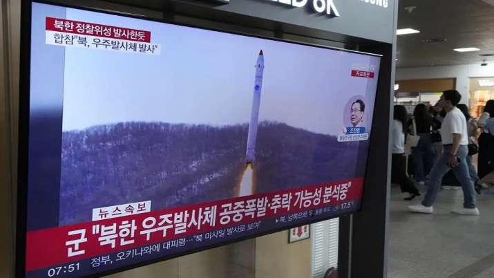 India Tv - A TV screen shows a North Korean rocket launch during a news event at Seoul Railway Station on May 31
