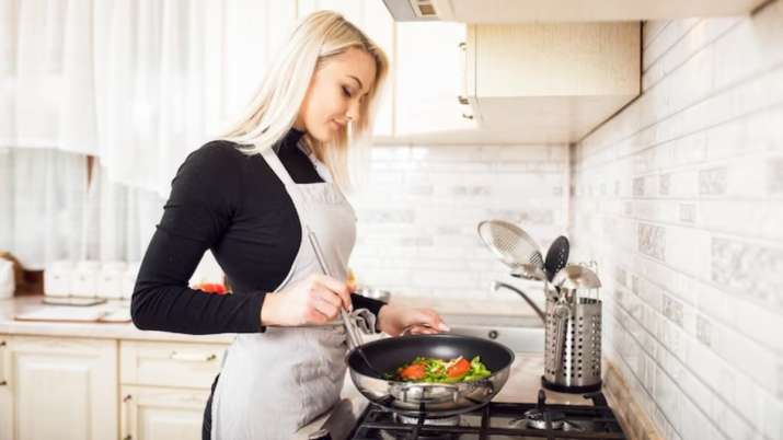 India Tv - Use an induction stove, which can work to minimize the heat wasted from your stovetop.