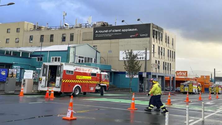 India Tv - Firefighters work near the hostel in central Wellington. 