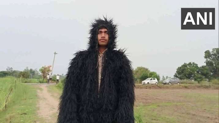 India Tv - Farmer wears 'bear costume' 