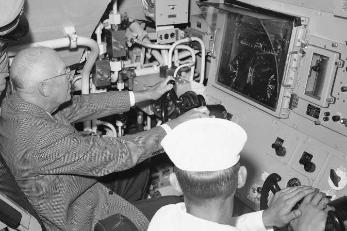 India Tv -  President Dwight Eisenhower tries his hand at the controls of the USS Patrick Henry ballistic missile submarine during a tour at Newport, R.I., on July 26, 1960.