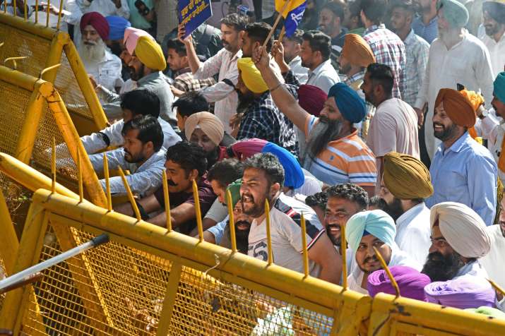 India Tv - AAP workers protest against the arrest of party's MP Sanjay Singh by ED in Delhi excise policy case, at BJP headquarters in New Delhi