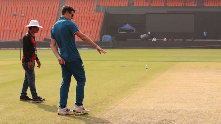 India Tv - Pat Cummins inspecting Narendra Modi Stadium pitch on Saturday