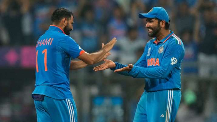 India Tv - Shami celebrates Williamson's wicket with Rohit Sharma.