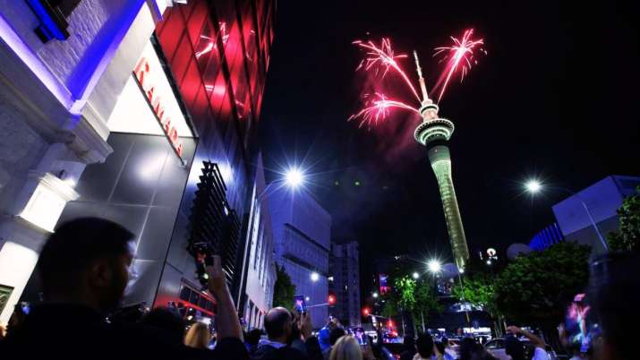 India Tv - thousands cheering a fireworks display sprouting from New Zealand’s tallest structure, Sky Tower.