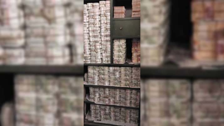 India Tv - Cash seized by the Income Tax department after raids against a Odisha-based distellery group and linked entities.
