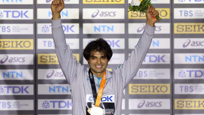 India Tv - Neeraj Chopra with his historic gold at the World Athletics Championships.