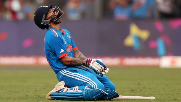 India Tv - Virat Kohli on his knees after scoring 50th ODI century.
