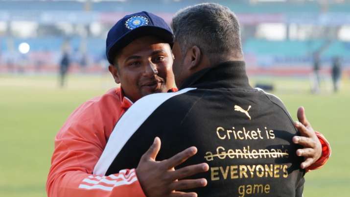 India Tv - Sarfaraz Khan hugged his father after getting the elusive India Test cap
