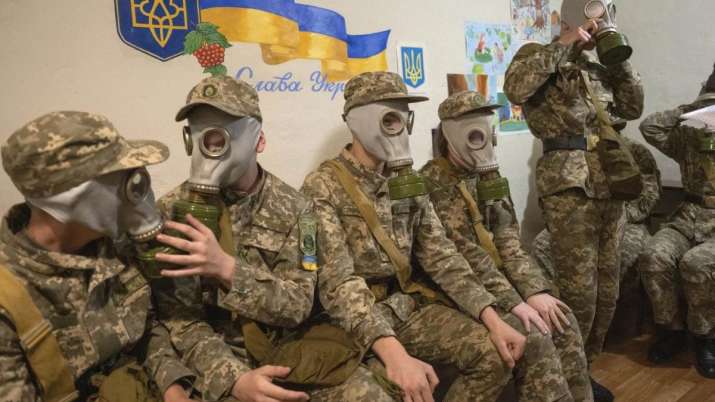 India Tv - Cadets practice trying on gas masks during a lesson in a bomb shelter in Kyiv, Ukraine,