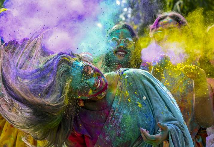 India Tv -  Women drenched in colours celebrate Holi, in Nadia