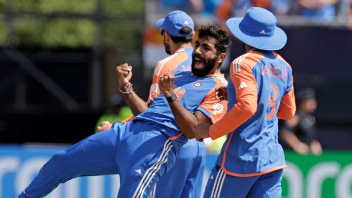 India Tv - Jasprit Bumrah exults after the big wicket of Mohammad Rizwan