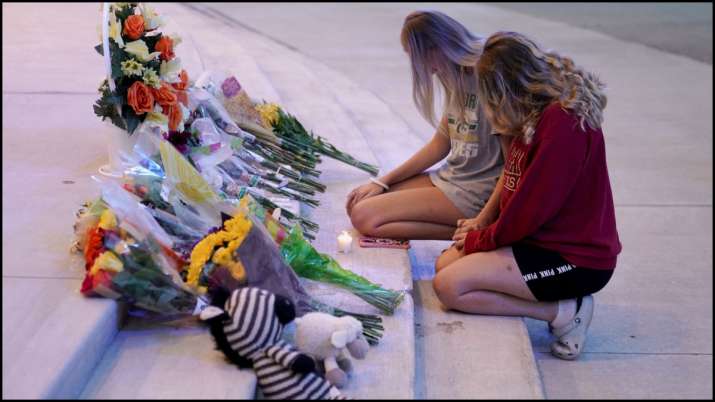 India Tv - People visit a memorial at Apalachee High School, Atlanta after the shooting.