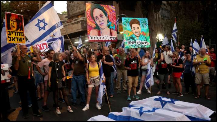 India Tv - People attend a demonstration calling for the immediate return of hostages held in Gaza.