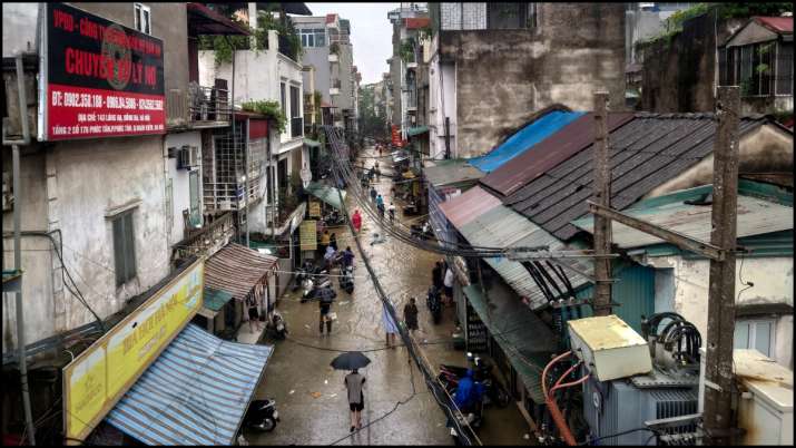 India Tv -  generic view of a flooded street following the impact of Typhoon Yagi in Hanoi, Vietnam