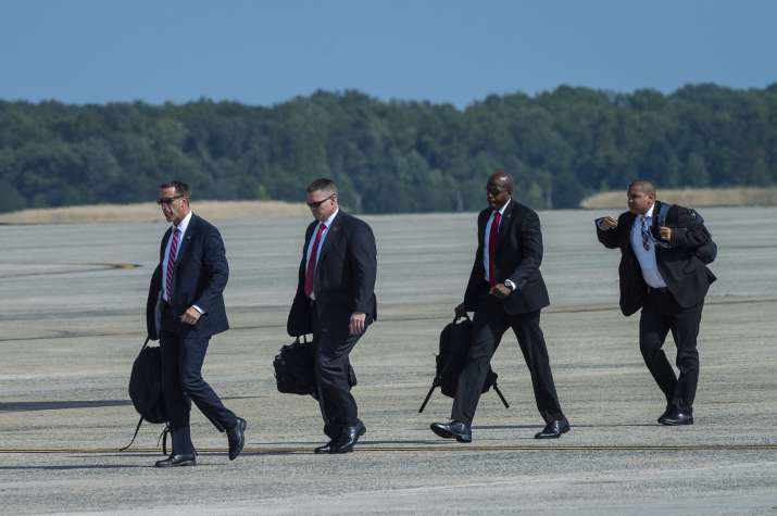 India Tv -  Members of President Joe Biden's Secret Service detail walk to Air Force One at Andrews Air Force B