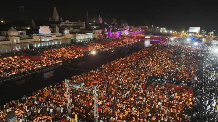 India Tv -  An aerial view of banks of the Saryu river illuminated with ‘diyas’ (earthen lamps) during ‘Deepots