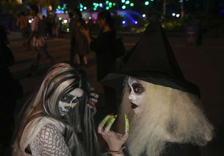 India Tv - Visitors dressed in a ghost costumes at Goosebump market as a part of Halloween festival