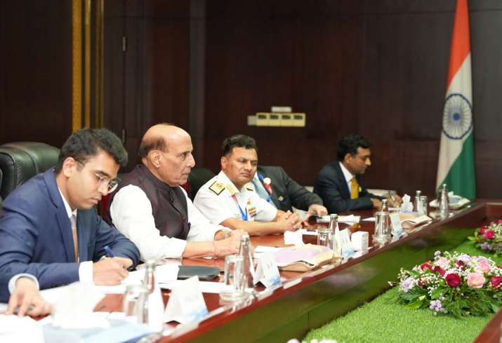 India Tv - Rajnath Singh with his Chinese counterpart Admiral Dong Jun in Vientiane