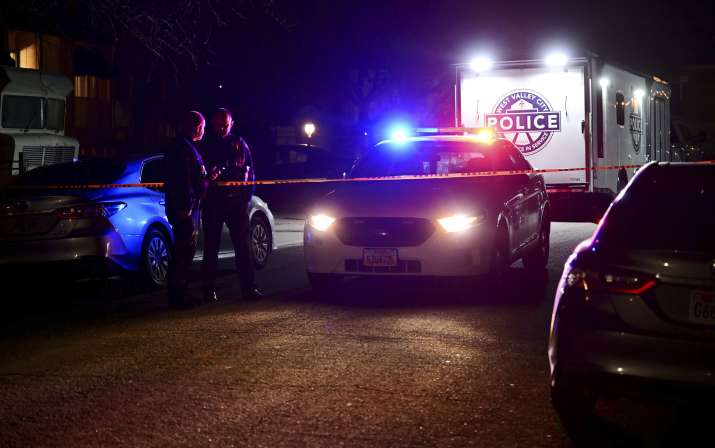 India Tv - Police investigate a crime scene where they say multiple family members were found dead inside a hom