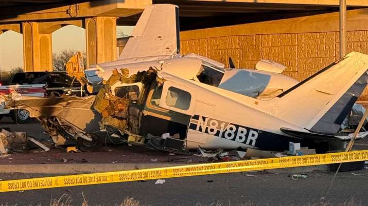 India Tv - Caution tape surrounds the scene after a plane crashed on a highway in Victoria, Texas.