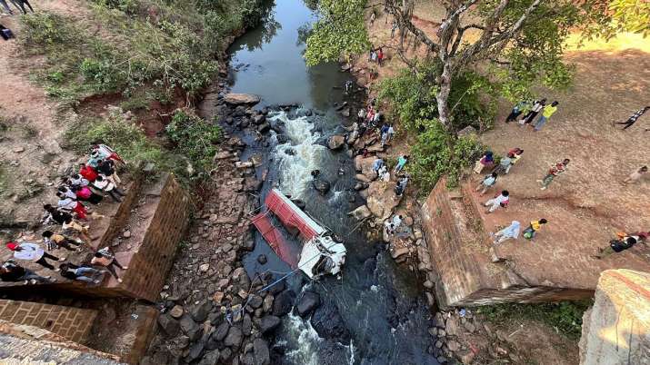 India Tv - People view a truck that fell off the Gelan Bridge as it was returning from a wedding ceremony in th