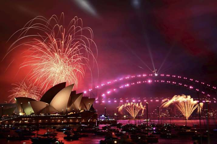 India Tv - Fireworks explode over Sydney Harbour ahead of New Year's Eve celebrations in Sydney, Tuesday, Dec. 