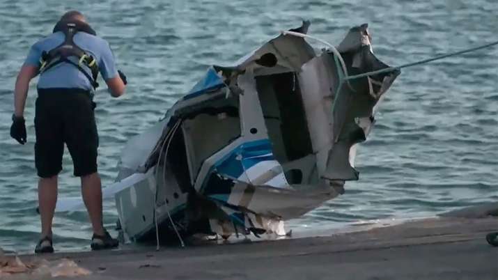 India Tv - A part of a plane wreckage are pulled onto shore on Rottnest Island.