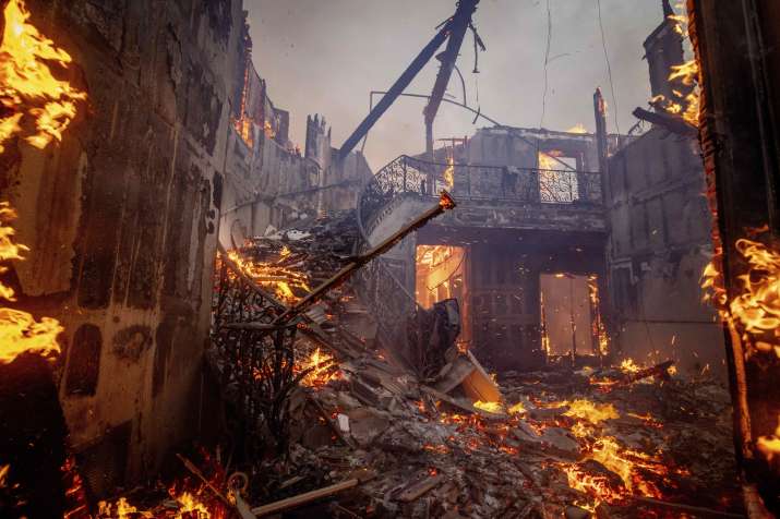 India Tv - - The Palisades Fire burns a residence in the Pacific Palisades neighborhood of Los Angeles