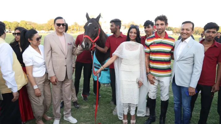 India Tv - Rajat Sharma and Ritu Dhawan pose for the cameras at the Polo final.