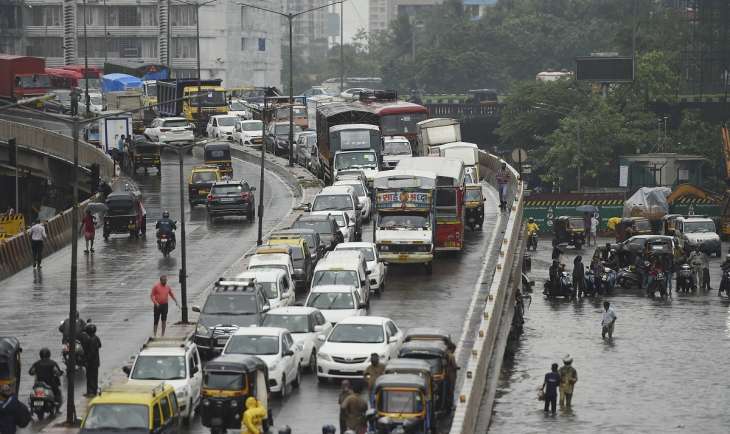 Mumbai Rains: Several areas waterlogged, IMD issues 'red' alert | India ...