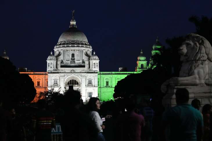 Victoria Memorial lit up in the colors of the Indian flag