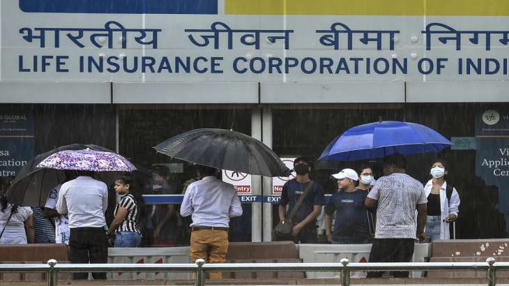 People use umbrellas to protect themselves from monsoon