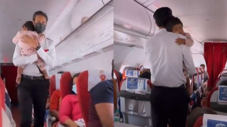 Air India's cabin crew calming down little baby girl