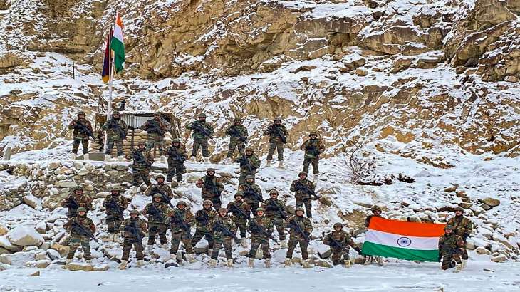Indian Army soldiers pose for a photograph with the