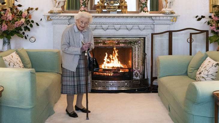 Britain's Queen Elizabeth II waits in the Drawing Room at