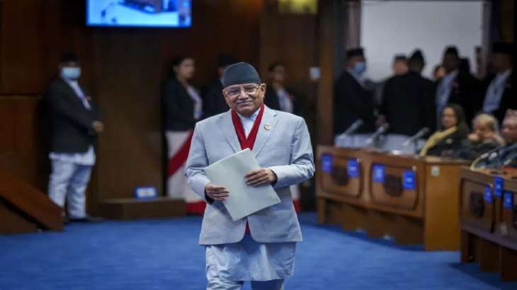 Nepalese Prime Minister Pushpa Kamal Dahal walks to speak