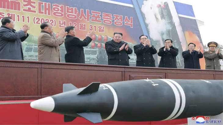 North Korean leader Kim Jong Un, center, attends a ceremony