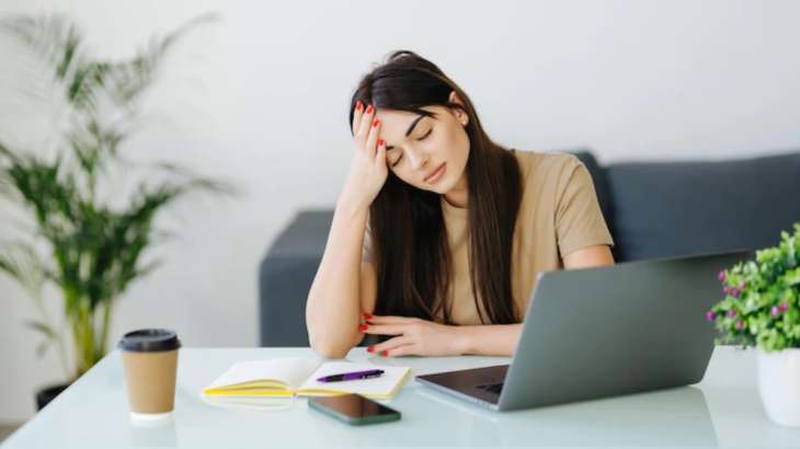 Representative image of a woman tired at work