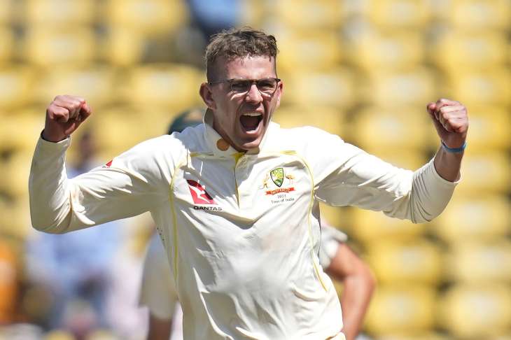 Todd Murphy celebrates taking a wicket