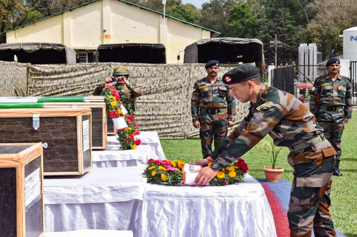 Poonch: Security personnel lay a wreath near the mortal