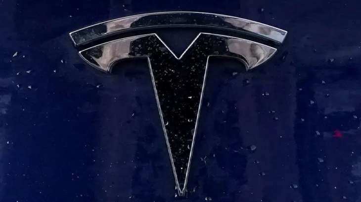 Tesla business news, Tesla  income drops, Tesla  income drops amid EV price cuts, Tesla operating in