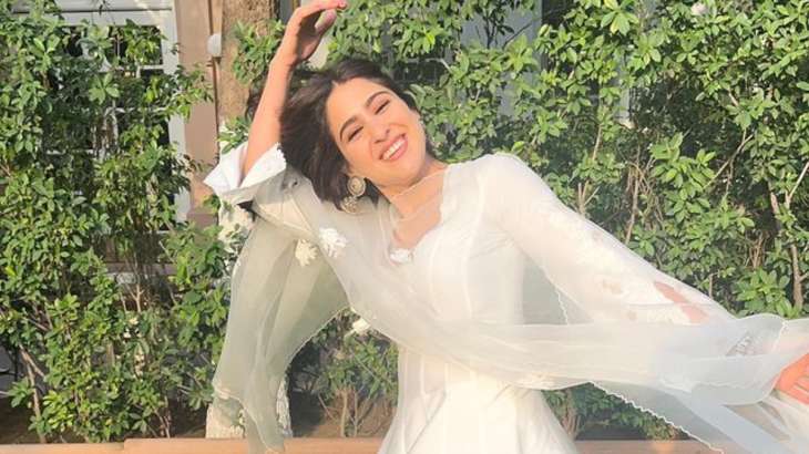 Sara Ali Khan looks elegant in a  white salwar suit.